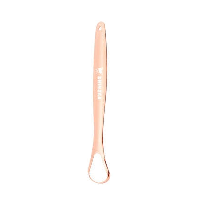 Shinzra rose gold tongue scraper